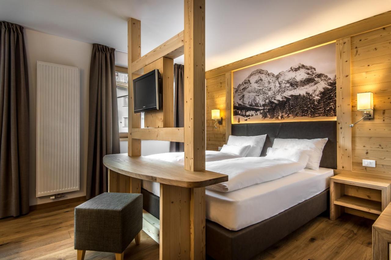 Garni Larix Hotel Колфоско Екстериор снимка
